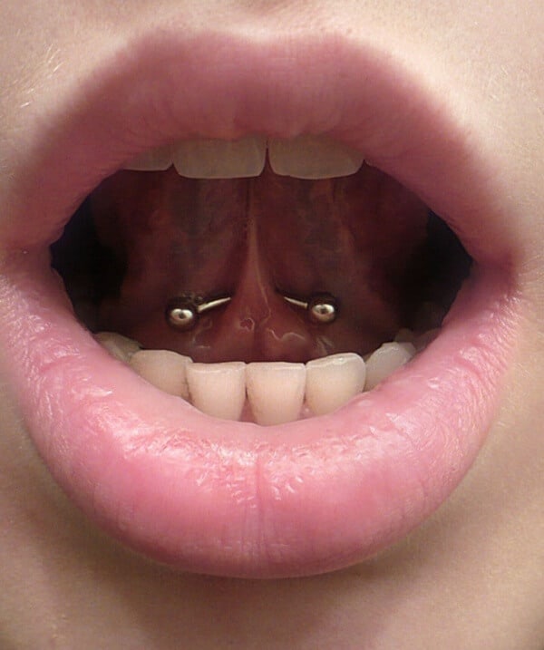 Tongue web piercing