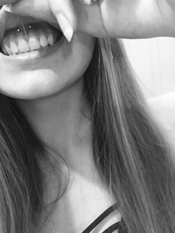 Smiley lip tattoo