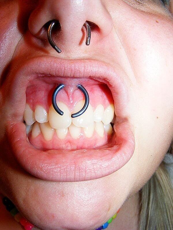 Frowny smiley piercing