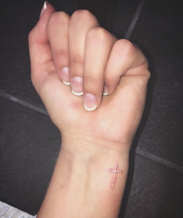 Cross finger tattoos, Finger tattoos, Simple finger tattoo