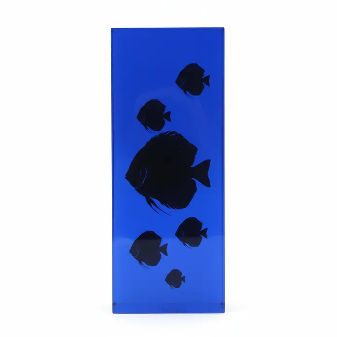 Minimalist black silhouette fish appearing at different depths in a deep-pour resin aquarium