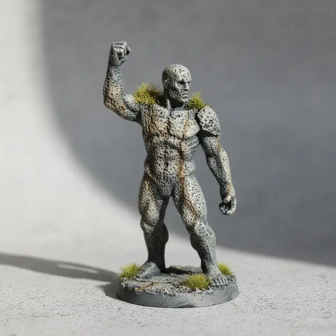 Humanoid miniature painted as weathered grey stone with moss, stains, and rough texture