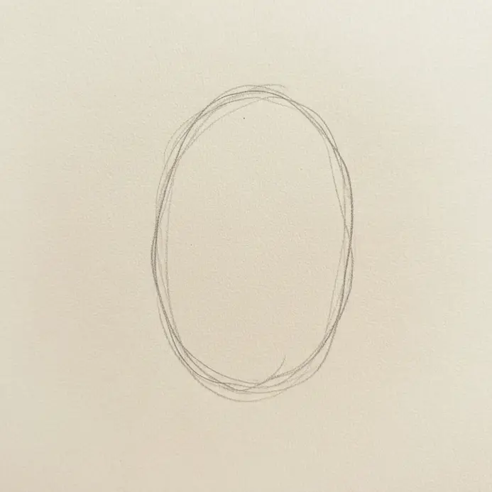 Diagram showing the initial oval shape used as a foundational guide for drawing a face.