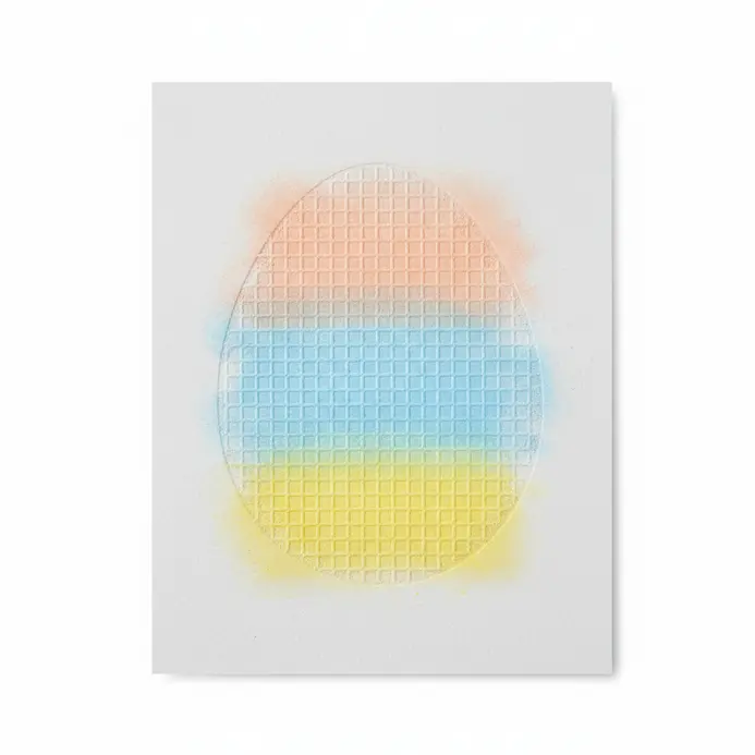 Chalk pastel rubbings of Easter eggs on textured paper.