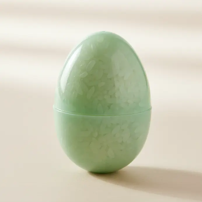 Plastic Easter eggs filled with rice as sensory shakers.