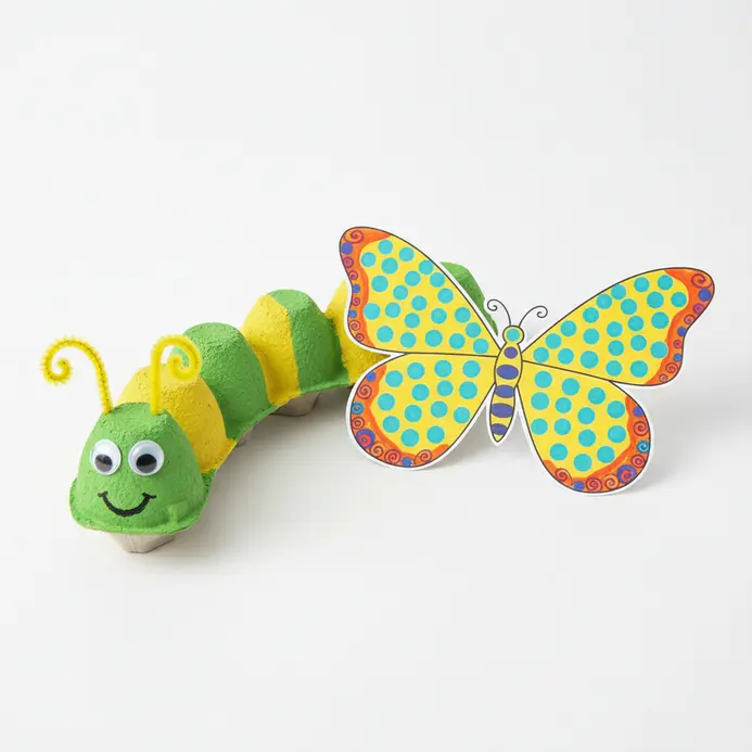 Painted egg carton caterpillar and butterfly wings with pipe cleaners.