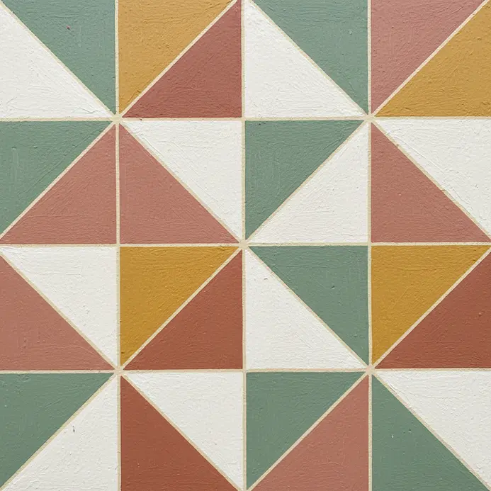 A crisp, repeating leaf stencil pattern in gold paint.