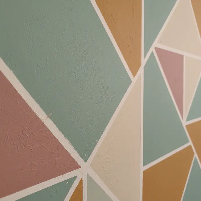 A wall with two thick, contrasting horizontal color bands.