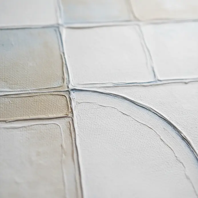 A large canvas painted with subtle variations of a single blue hue.