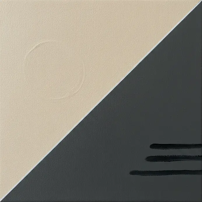A textured paint surface with thick impasto strokes on a neutral ground.
