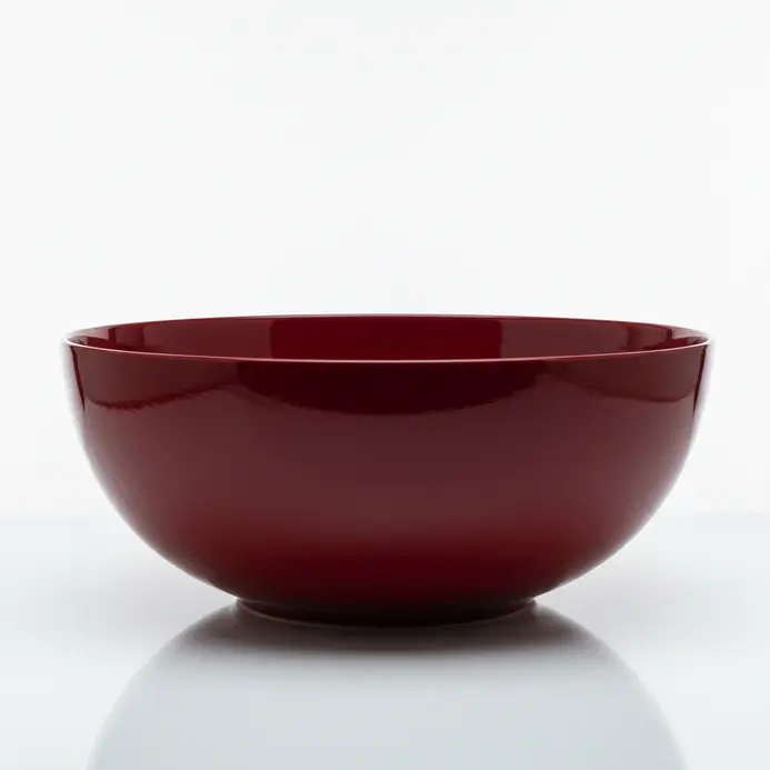 Functional paper mache bowl with a smooth lacquered surface