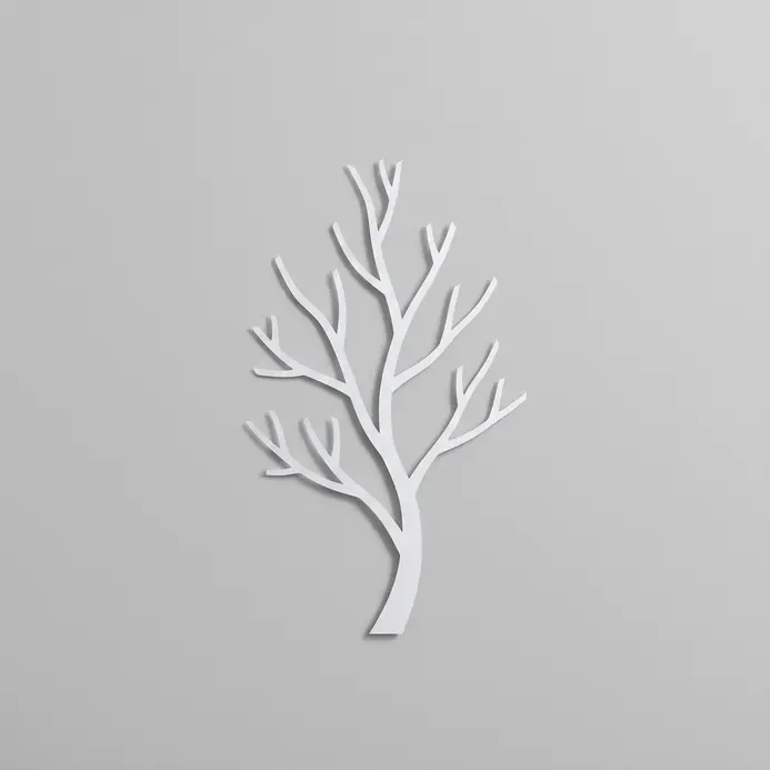 Scandinavian minimalist paper cutout of a bare tree branch