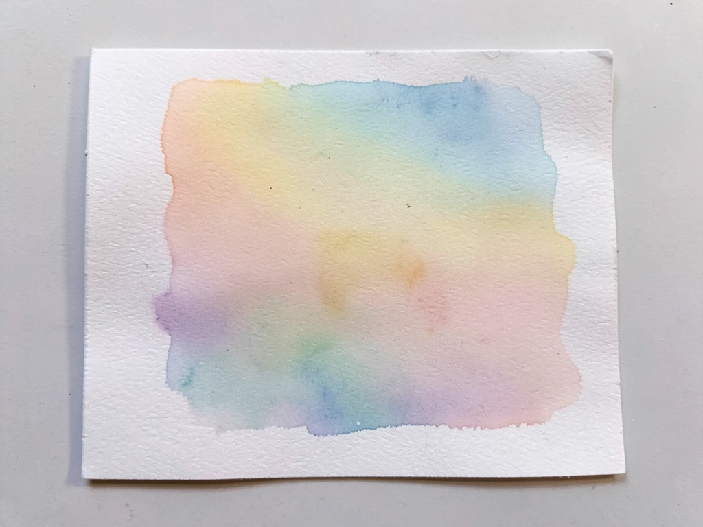 Watercolor gradient background with a handwritten quote overlay
