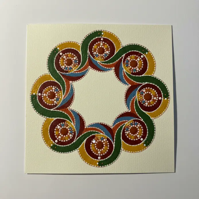 A repeating border composed of interlocking circles shaped entirely by continuous lines of tightly spaced blue paint spots.