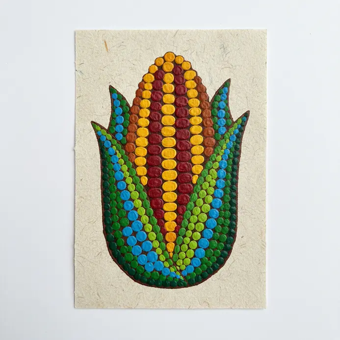 An artistic corn cob rendering featuring distinct linear rows of bright multi-colored dots acting as individual kernels.