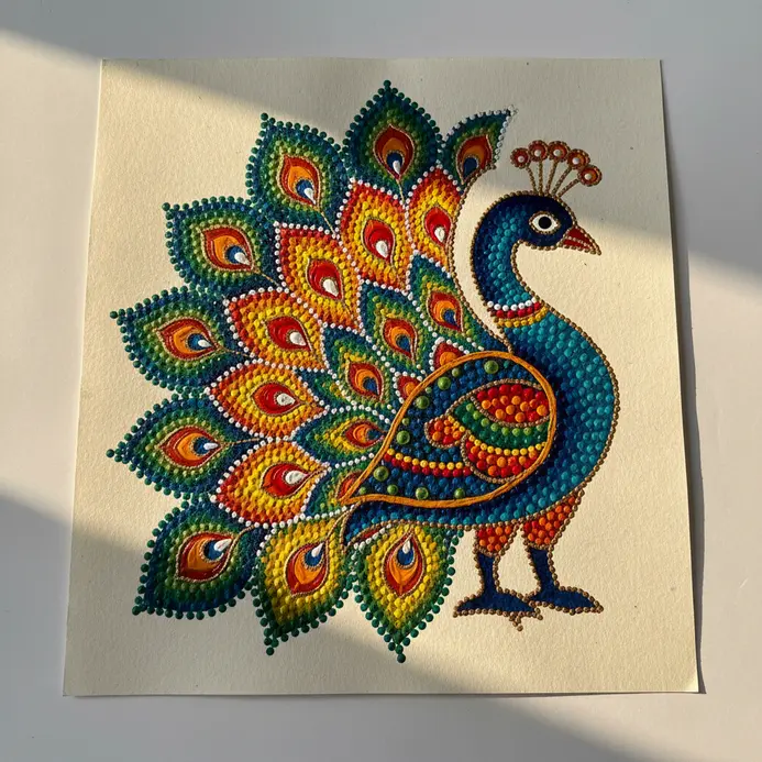 A stylized peacock tail rendered entirely in vibrant blue and green acrylic dots filling clear teardrop borders.