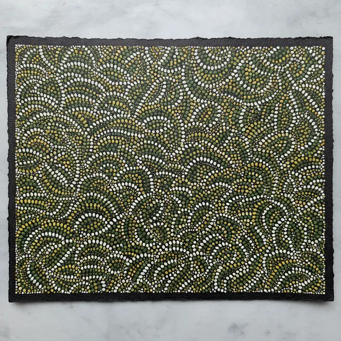 Miniature uniform leaf illustrations drawn with a precise black pen fill a large internal shape compartment.