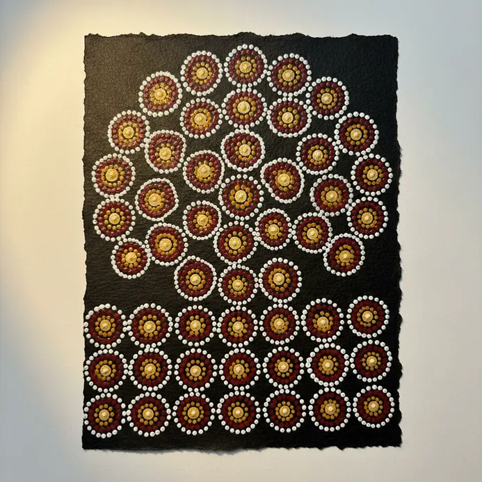 Clusters of tiny black ink circles are evenly distributed across the lower segment of the drawing.