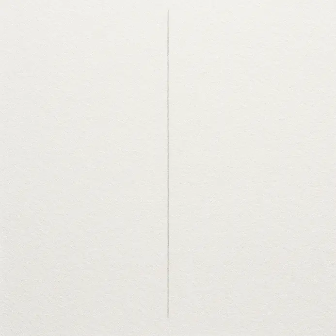 A faint vertical pencil line runs down the center of a white sheet of drawing paper, establishing the main axis.