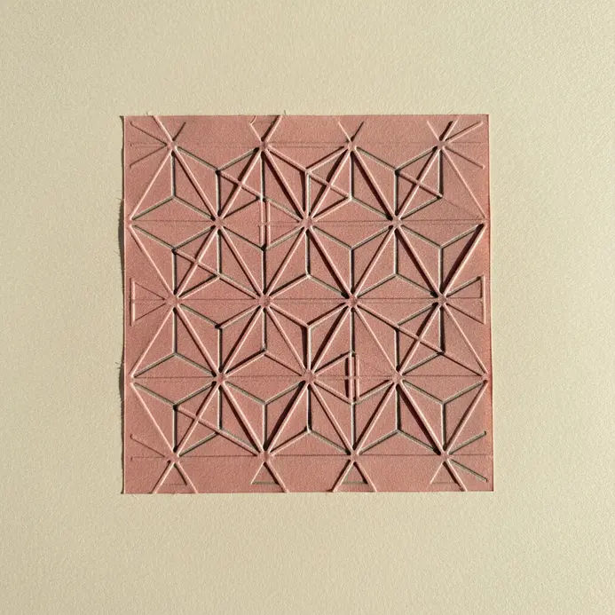 A scrapbook layout with a vertical border strip made from embossed cardstock with a diamond pattern.