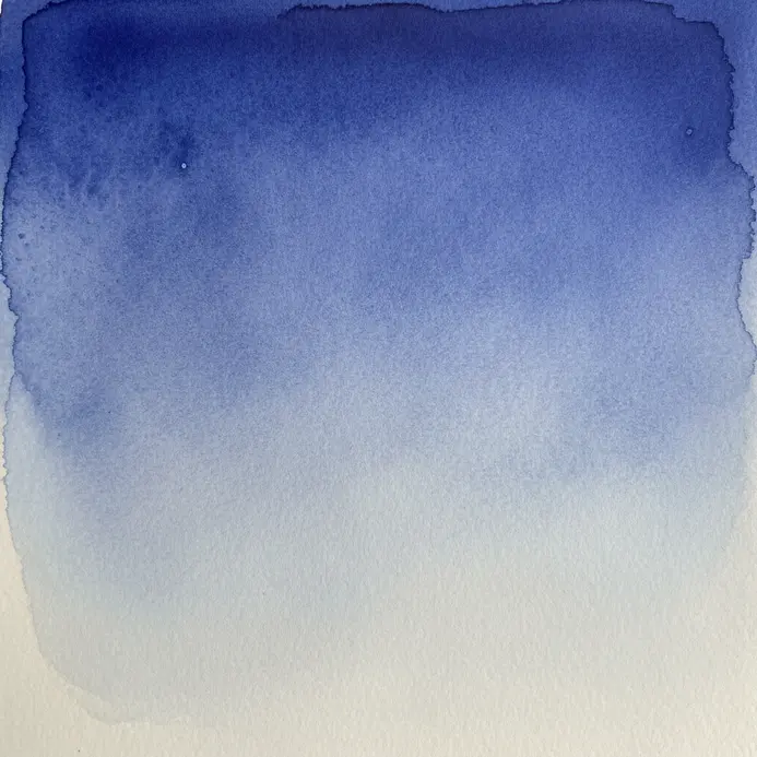 A gradient watercolor wash transitioning from deep indigo to pale blue on textured paper.