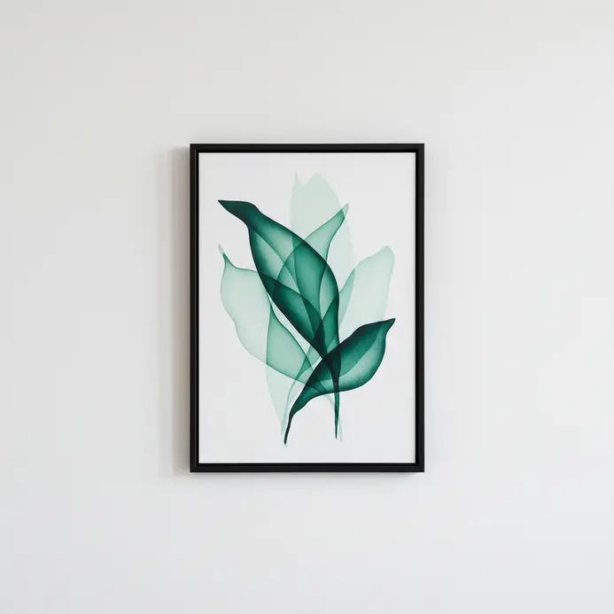 A large framed artwork featuring abstract green botanical shapes on a white background hanging in a bathroom.