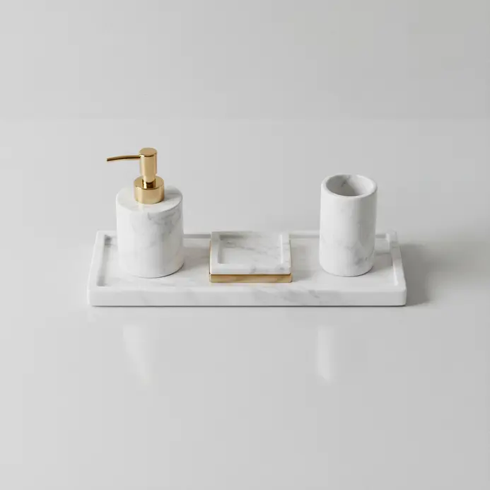 A rectangular tray with a white marble surface organizing daily essentials like perfume bottles and rings.