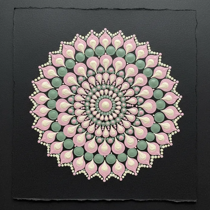 A precise, radial drawing of a mandala with repeating lotus petal shapes forming a symmetrical circle.