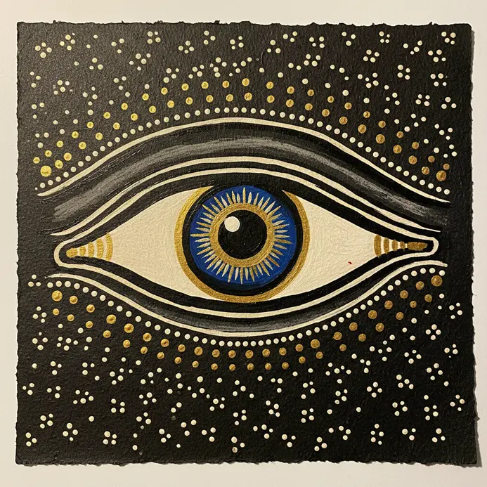 A single large eye with thick black outlines and subtle color wash, Pattachitra style, on cloth paper.