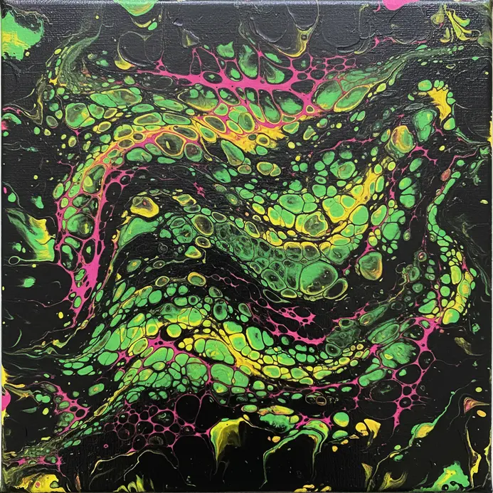 Swirls and cells of neon green, pink, and yellow acrylic paint floating in a black pour medium.