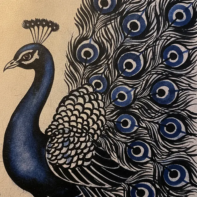 Small black dots added to the center of each blue circle on the tail.