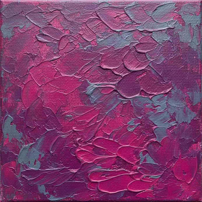 A thick, stretched canvas that seems suspended within the recess of a shadow box frame.