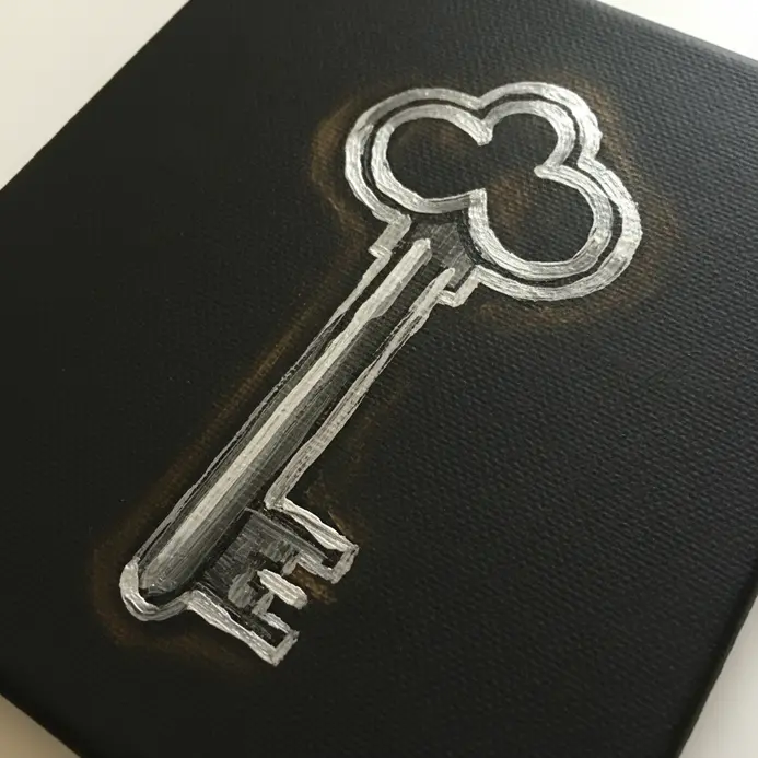A detailed outline drawing of an ornate skeleton key painted in metallic silver acrylics.