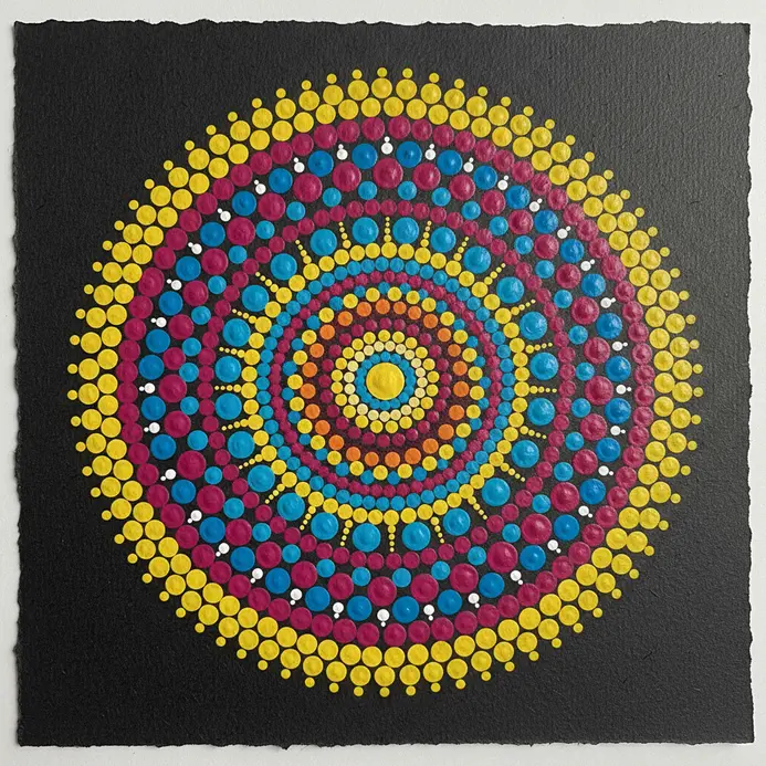 A vibrant mandala with layers of dots in every color of the rainbow, creating a festive effect.