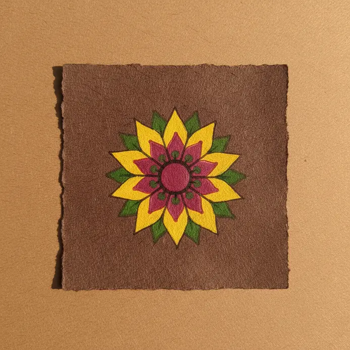 A simple flower motif with pointed petals resembling a star, painted with flat, bright colors.