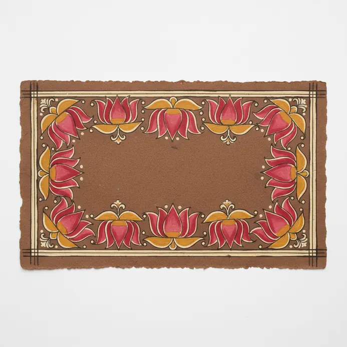 A repeating border design featuring stylized lotus flowers drawn with black ink on paper.