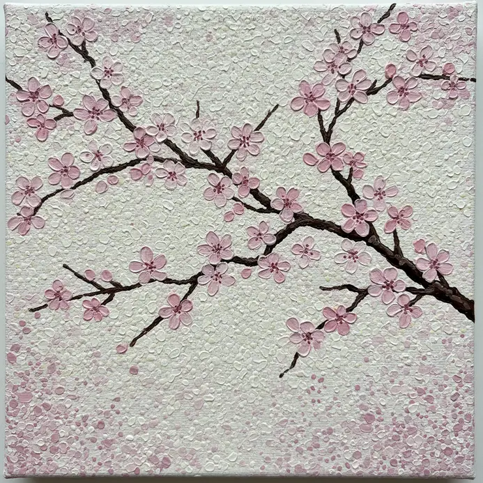 A pink cherry blossom branch formed entirely from individual dots in a pointillism style.