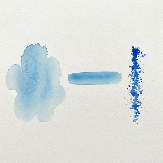 A round brush making three distinct marks: a watery bloom, a medium-value stroke, and a dry, textured line.