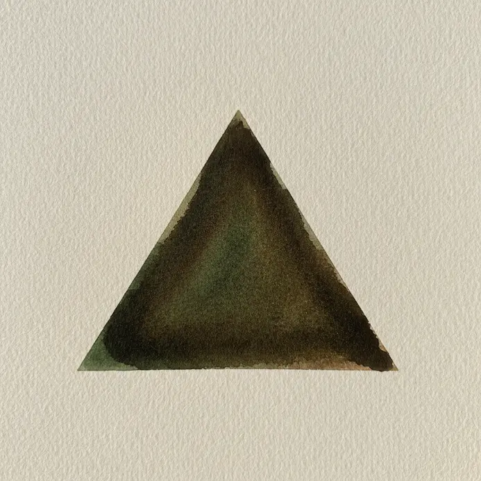 A precise, dark green triangle painted on completely dry, textured watercolor paper.