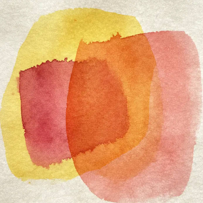 A section showing a yellow wash with a transparent red glaze layered on top, creating a luminous orange.