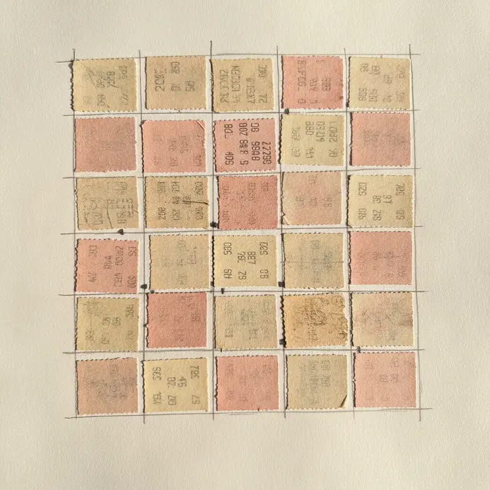 Nine ticket stubs from concerts and movies arranged in a precise grid on a kraft paper background.