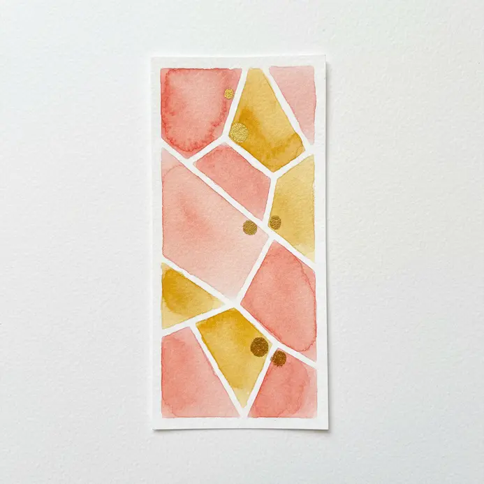 Overlapping geometric shapes in watercolor with lines and dots of metallic gold acrylic paint.