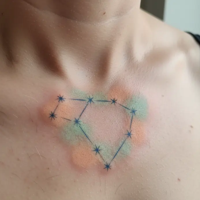 Delicate Libra constellation stars connected by faint lines, with a soft blush of peach and mint watercolor wash along the collarbone.