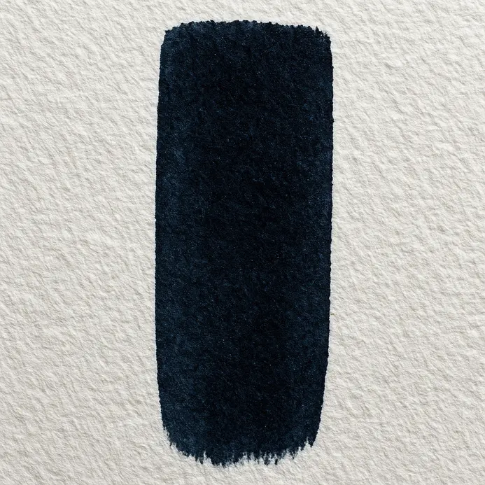 A precise watercolor stroke with a hard edge painted onto dry paper.
