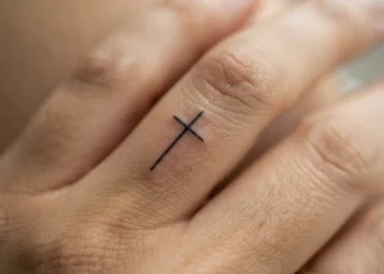 Cross On Finger Tattoo Ideas