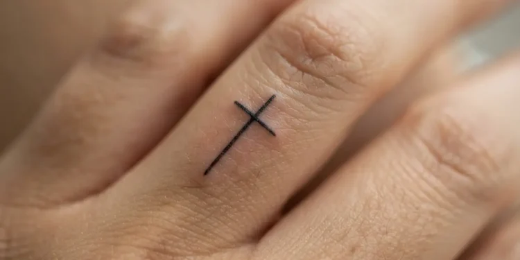 Cross On Finger Tattoo Ideas