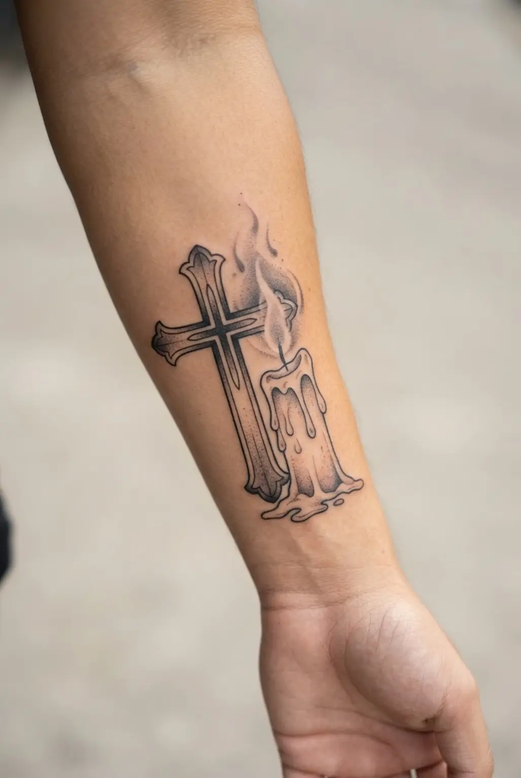 Gothic cross tattoo ideas featuring a black ink cross beside dripping candle wax and deep shaded flames.