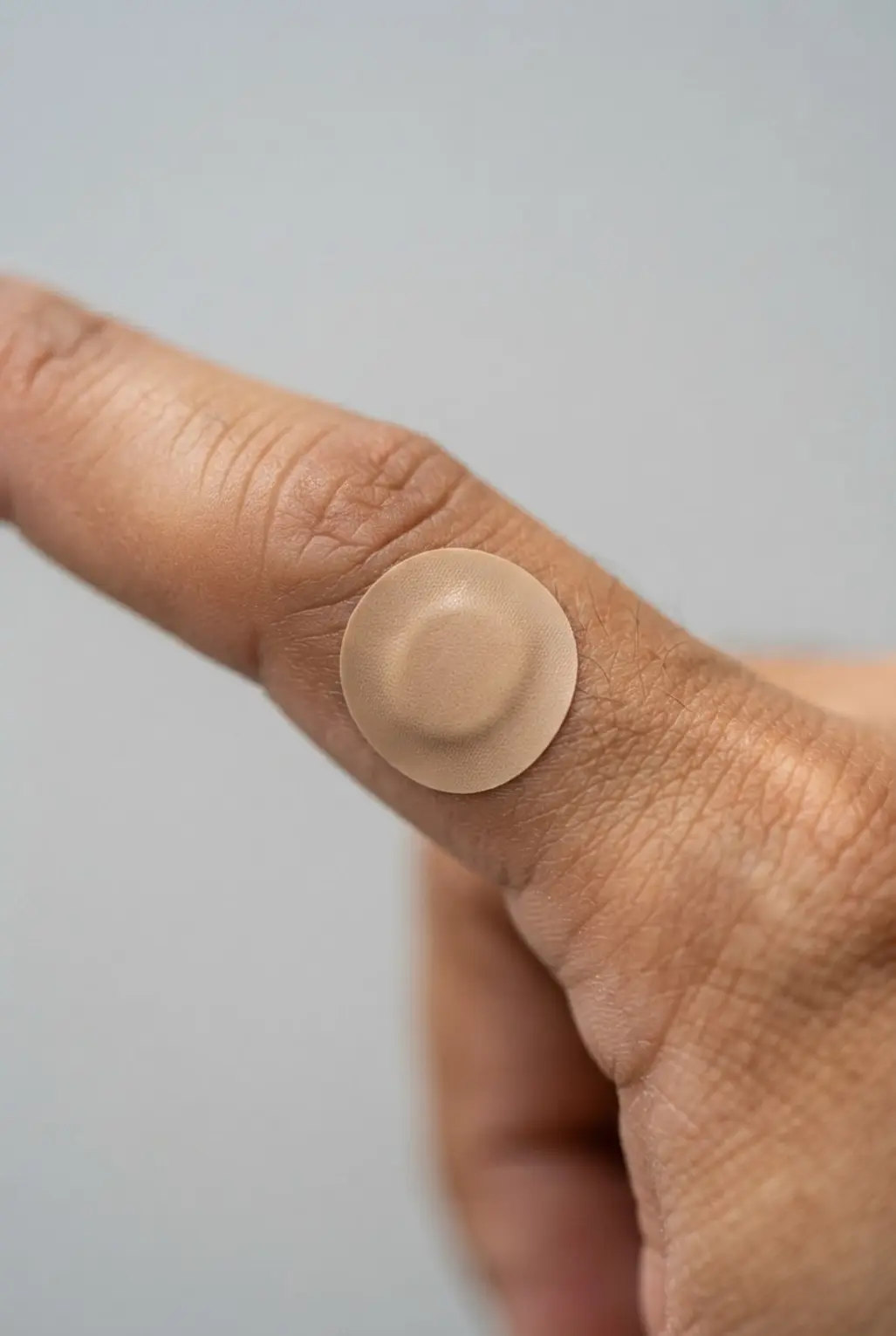 A waterproof, skin-tone adhesive patch offering durable and discreet tattoo coverage.
