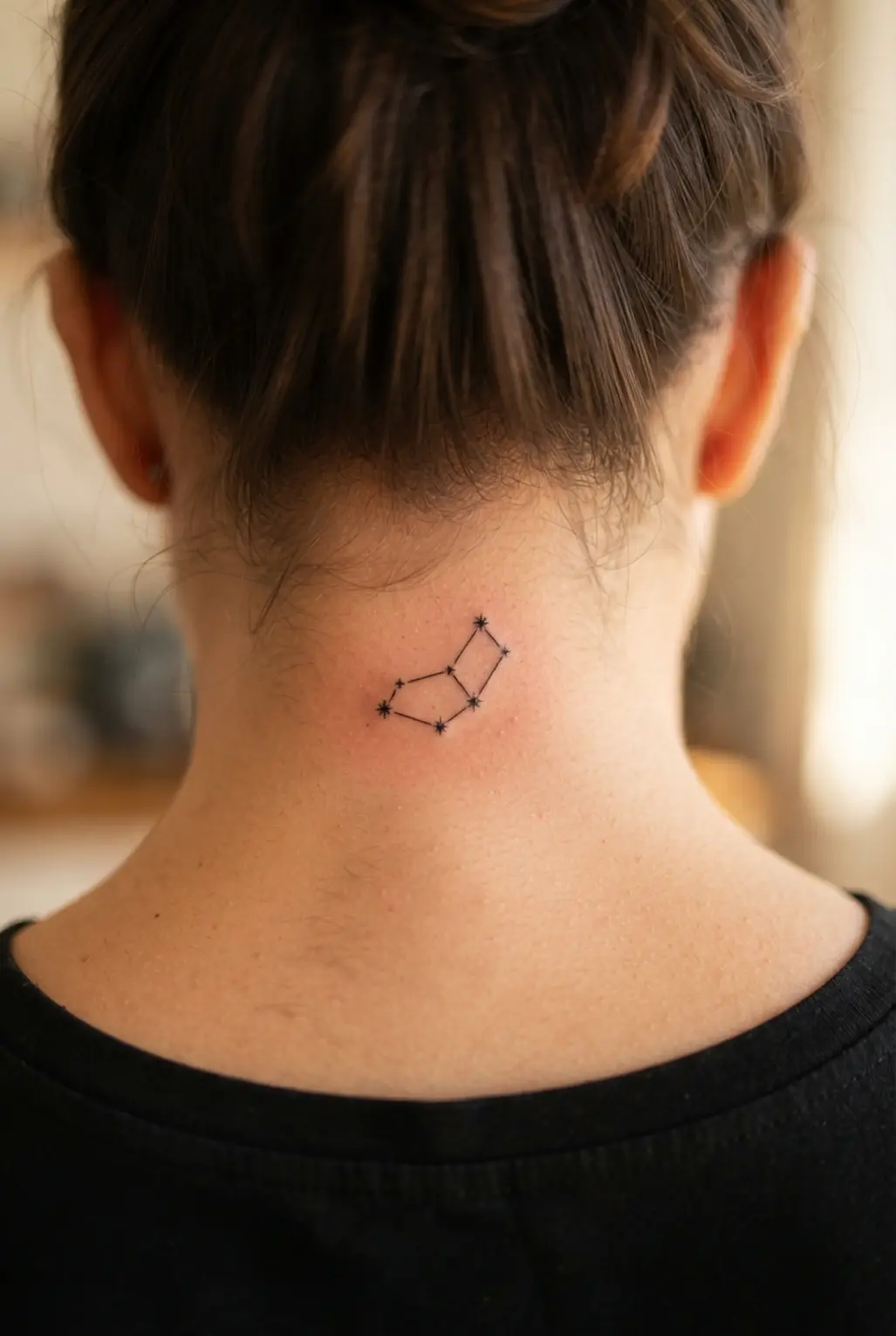 Tiny star constellation arranged across the nape with small points and delicate connecting lines.