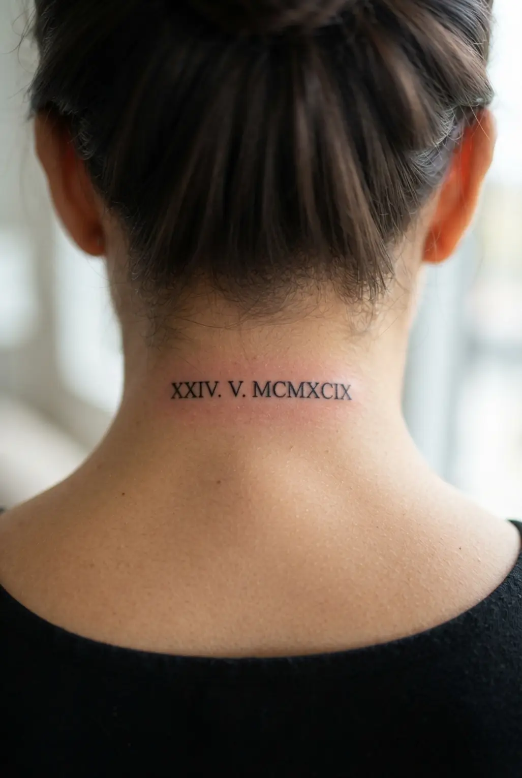Miniature Roman numeral date arranged in a horizontal line beneath the hairline on the neck.